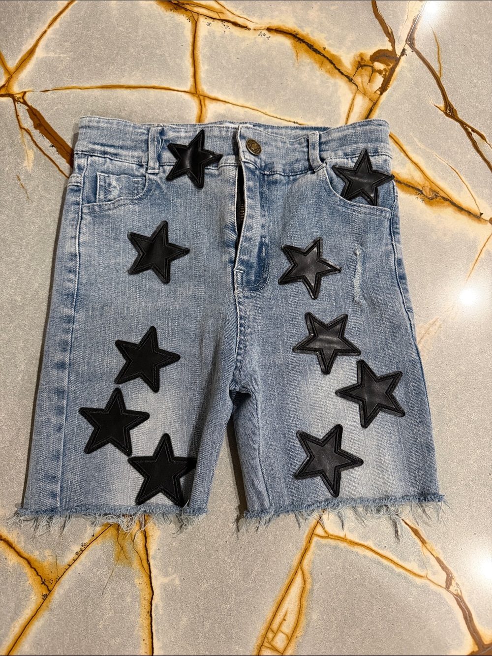 Light Blue Denim Shorts with Black Star Appliqués